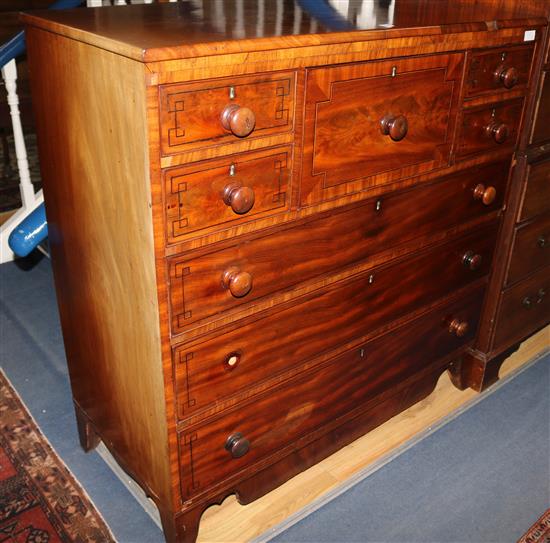 A large Regency inlaid mahogany chest of drawers, W123cm